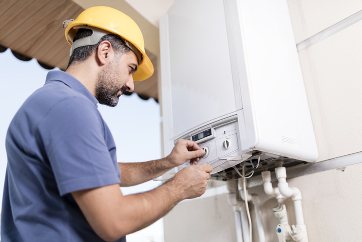 plumber servicing gas line